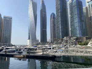 Luxury yachts docked at Dubai Marina with skyline view – MTS Yachts Dubai