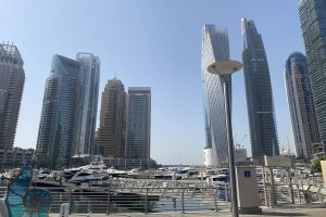 Customer at Dubai Marina Walk before private yacht tour with MTS Yachts Dubai